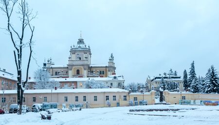 LVIV, UKRAINE - DECEMBER 04, 2017: St. George Cathedral (build in 1746-1762, designed by architect Bernard Meretyn and sculptor Johann Georg Pinsel). Overcast early morning winter cityscape.のeditorial素材