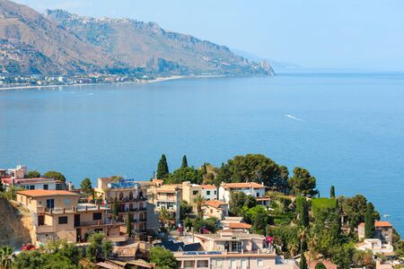 TAORMINA, ITALY - JUNE 11, 2017: Taormina aerial view from "Stairs to Taormina", Sicily, Italy.のeditorial素材