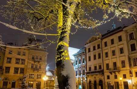 LVIV, UKRAINE - FEBRUARY 04, 2018: Beautiful night winter central Rynok Square cityscape with Christmas decorations.のeditorial素材