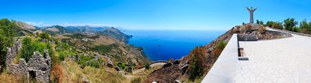 MARATEA, ITALY - JUNE 20, 2017: The San Biagio mountain with the statue of Christ the Redeemer (Cristo Redentore) on Tyrrhenian sea coast near Maratea, Basilicata, Italyのeditorial素材