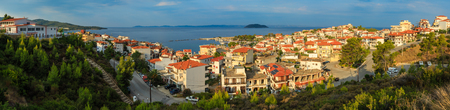 Summer morning top panorama view on coastal Neos Marmaras village (Halkidiki, Sithonia, Greece). People and signs unrecognizable.の写真素材