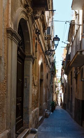 SYRACUSE, ITALY - JUNE 12, 2016: Ortigia island at city of Syracuse street view, Sicily, Italy. Beautiful travel photo of Sicily.のeditorial素材