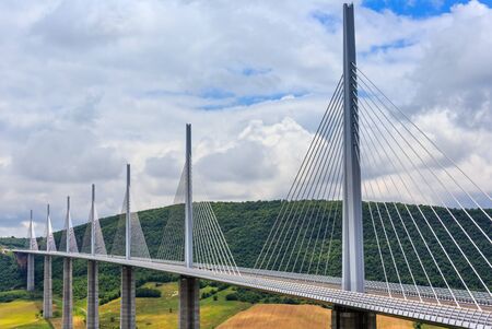 MILLAU, FRANCE -  JUNE 03, 2016: Cable-stayed bridge Millau Viaduct over summer valley River Tarn.のeditorial素材