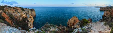 Lagos lighthouse on the Ponta da Piedade headland (Algarve, Portugal). Evening scenery.の写真素材