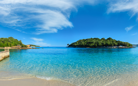 Beautiful Ionian Sea with clear turquoise water and morning summer coast. View from Ksamil beach, Albania.の写真素材