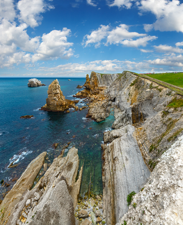 Atlantic ocean rocky coastline near Portio Beach, Pielagos, Cantabria, Spainの写真素材