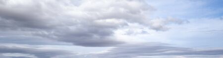 Clouds in the overcast sky view. Climate, environment and weather concept sky background.