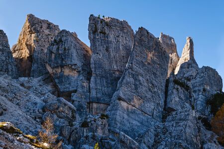 Sunny autumn alpine Dolomites rocky  mountain scene, Sudtirol, Italy. Cinque Torri (Five pillars or...
