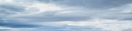 Clouds in the overcast sky view. Climate, environment and weather concept sky background.