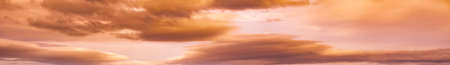 Summer sunset dranatic sky panorama with fleese clouds. Summer evening sky and weather concept...