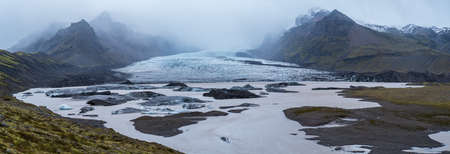 Glacier tongue slides from the VatnajÃ¶kull icecap or Vatna Glacier near subglacial...