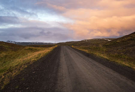 View during auto trip in West Iceland highlands, Snaefellsnes peninsula, Snaefellsjokull National Park. Spectacular volcanic tundra landscape with mountains, craters, lakes, gravel roads.の写真素材
