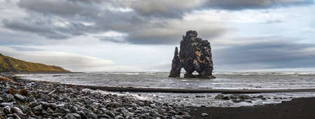 The drinking elephant or rhinoceros, basalt stack Hvitserkur along the eastern shore of Vatnsnes peninsula, in northwest Iceland. Awesome rock structure made from basalt and standing 15 metres tall.の写真素材
