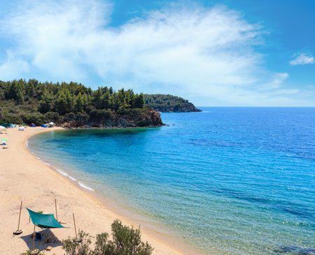 Summer Aegean Sea coast landscape with sandy beach and wild camping (Sithonia, Halkidiki, Greece. People unrecognizable.の写真素材