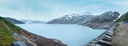 Lake Svartisvatnet and cloudy view to Svartisen Glacier (Meloy, Norway). Panorama.の写真素材