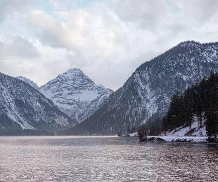 Plansee lake and mountain winter view, Tirol, Austria.の写真素材