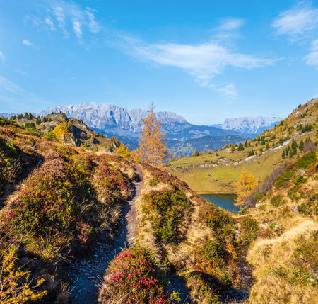 Autumn alpine Grosser Paarsee or Paarseen lake, Dorfgastein, Land Salzburg, Austria. Alps Hochkonig rocky mountain group view in far. Picturesque hiking, seasonal, and nature beauty concept scene.の写真素材