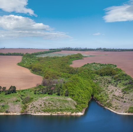 Amazing spring view on the Dnister River Canyon with picturesque rocks, fields, flowers. This place named Shyshkovi Gorby,  Nahoriany, Chernivtsi region, Ukraine.の写真素材