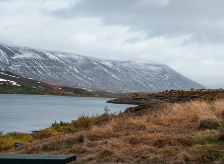 View during auto trip in Iceland. Spectacular Icelandic landscape with  scenic nature: mountains, fjords, fields, clouds, glaciers, waterfalls.の写真素材