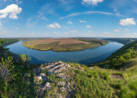 Amazing spring view on the Dnister River Canyon with picturesque rocks, fields, flowers. This place named Shyshkovi Gorby,  Nahoriany, Chernivtsi region, Ukraine.の写真素材