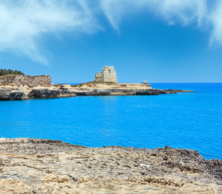 Ancient small caves on picturesque Adriatic sea coast Archaeological Area of Roca Vecchia, Salento, Puglia, Italyの写真素材