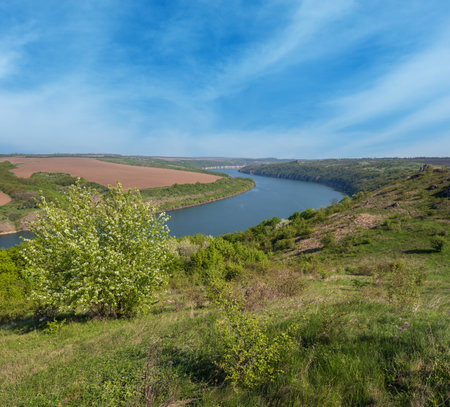 Amazing spring view on the Dnister River Canyon with picturesque rocks, fields, flowers. This place named Shyshkovi Gorby,  Nahoriany, Chernivtsi region, Ukraine.の写真素材