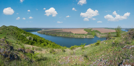 Amazing spring view on the Dnister River Canyon with picturesque rocks, fields, flowers. This place named Shyshkovi Gorby,  Nahoriany, Chernivtsi region, Ukraine.の写真素材