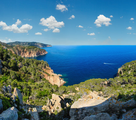 Summer sea rocky coast view (Costa Brava, Catalonia, Spain). Three shots stitch panorama.の写真素材