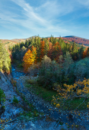 Autumn Carpathian Mountains landscape and river Bystrytsia of Solotvyn (Guta, Ivano-Frankivsk oblast, Ukraine). View from above.の写真素材