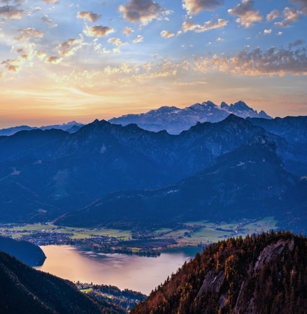 Picturesque autumn morning Alps mountain Wolfgangsee lake view from Schafberg viewpoint, Salzkammergut, Upper Austria. Beautiful travel, hiking, seasonal, and nature beauty concept scene.の写真素材