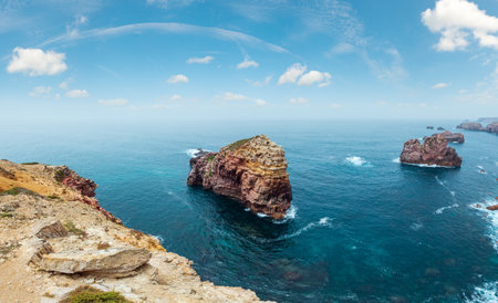Rock formations near shore. Summer Atlantic rocky coast view (Costa Vicentina, Algarve, Portugal).の写真素材