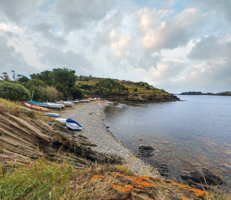 Bay Cala de Portlligat summer view with beach and boats (Cadaques, Girona, Spain).の写真素材