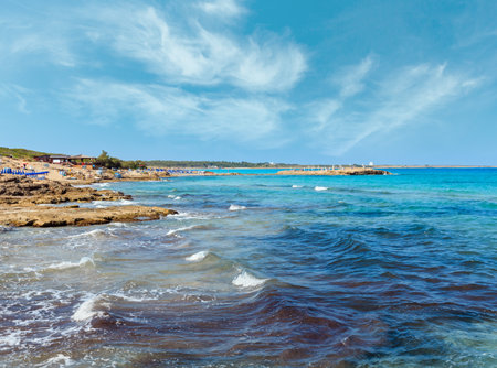 Picturesque Ionian sea beach Punta della Suina near Gallipoli's town in Salento, Puglia, Italy. People unrecognizable.の写真素材