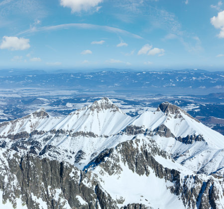 Winter rocky mountain landscape (Tatranska Lomnitsa, High Tatras, Slovakia).の写真素材