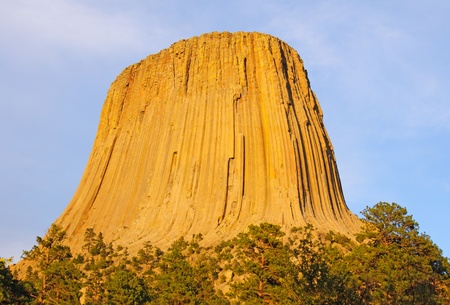Devil's Tower in Wyoming in the red glow of sunsetの写真素材