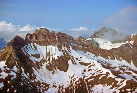Mountains in the sky in Glacier Bay National park in Alaskaの写真素材