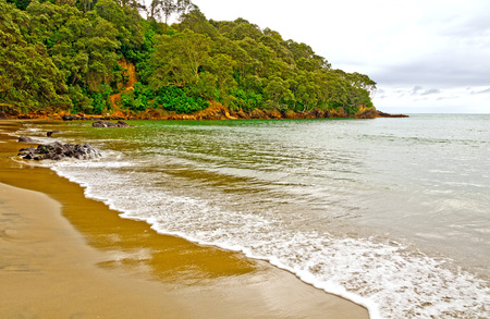 Orokawa Beach in a Cloudy Day in New Zealandの写真素材