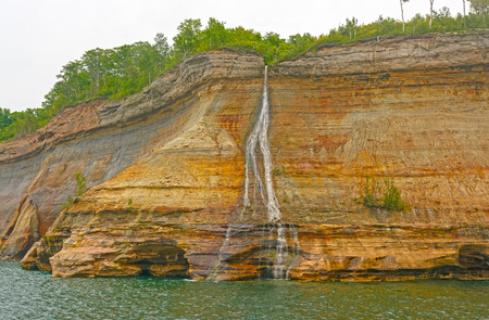 Bridal Veil Falls on the Shore of Lake Superior in Pictures Rocks National Lakeshoreの写真素材