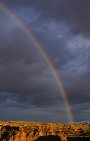 Rainbow at Sunset over Canyon de Chelly in Arizonaの写真素材