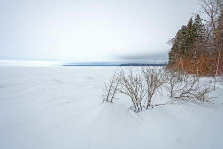 Frozen Lakeshore Panorama in Winter on Lake Michigan in Peninsula State Park in Wisconsinの写真素材