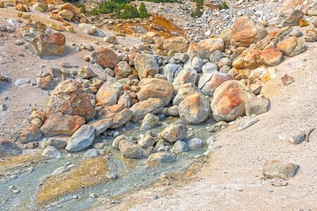 Colorful Volcanic Rocks in the Bumpass Hell Hydrothermal Area in Lassen Volcanic National Park in...