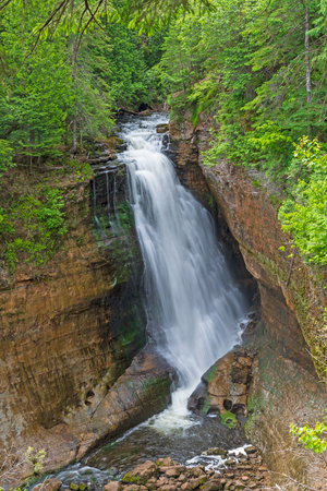 Secluded Waterfall in the North Woods at Miners Falls in Pictured Rocks National Lakeshore in Michiganの写真素材