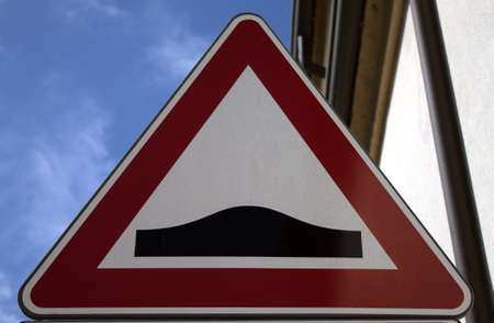 italian road sign (warning sign speed bump)の写真素材