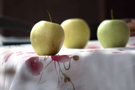 some apples on a tableの写真素材
