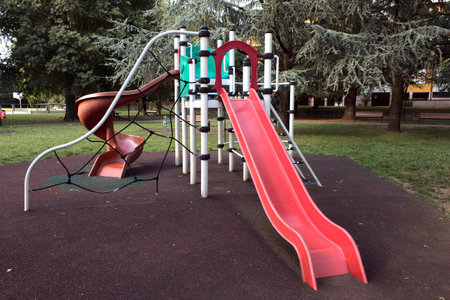 a playground in a public park in northern italyの写真素材