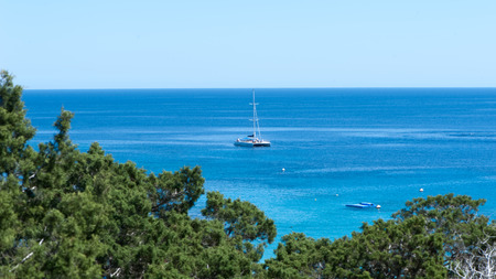 Blue sea and white yacht, theme of summer holidays, holidays, travelの写真素材