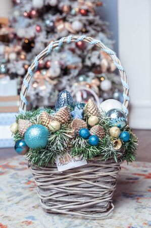 Basket with New Year's toys in soft pastel colors. Christmas moodの写真素材