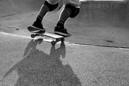 Skateboarder in a bowl of a skate park