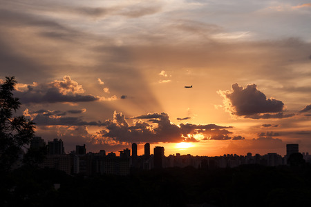 Plane landing in Sao Paulo, Brazil, during the sunset,の写真素材