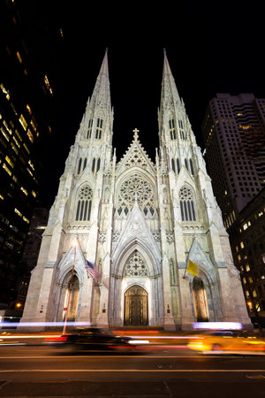 Manhattan, New York, April 8, 2016. View to the St. Patricks Cathedral in Midtown Manhattan at night in the famous 5fth Avenue.のeditorial素材